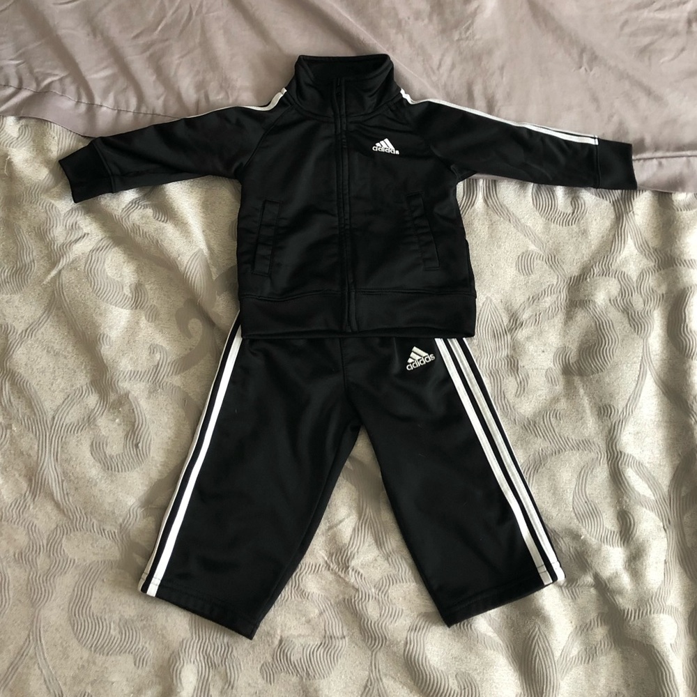 Black and White Addidas track suit size 12M